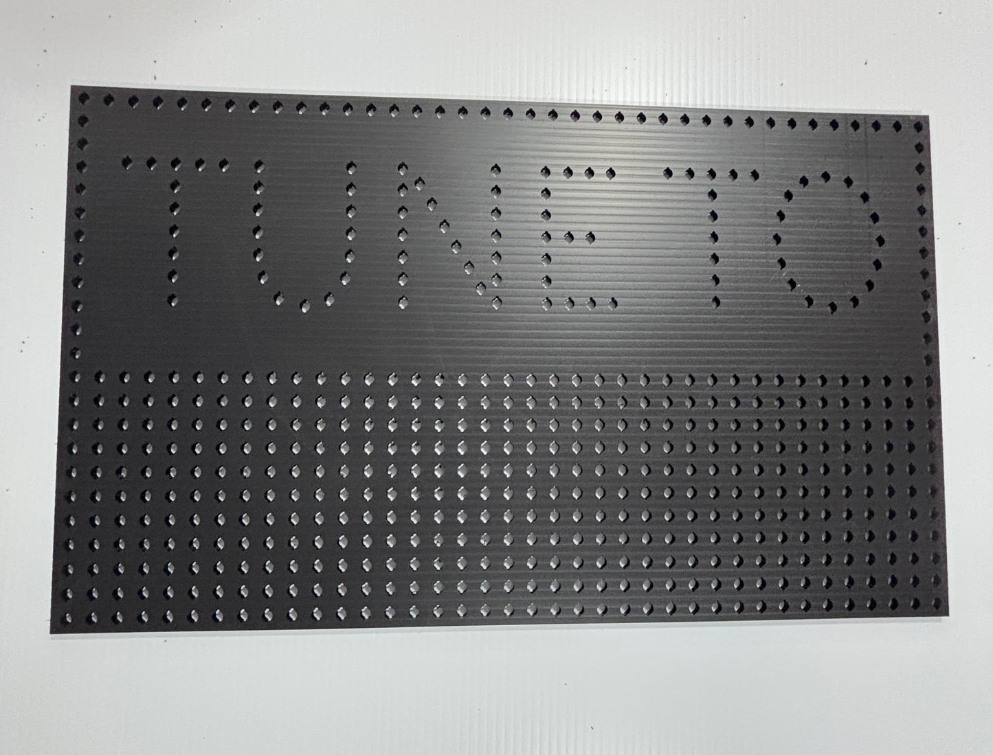 "Tune To" Sign